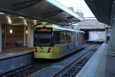 Manchester Metrolink Tram M5000 no. 3064 departs from Manchester Airport on 13th March 2018 towards Victoria station. Manchester Metrolink Tram M5000 no. 3064 departs from Manchester Airport on 13th March 2018 towards Victoria station.