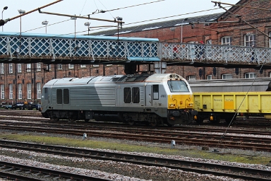 Shropshire-and-Wresham-livered DB Cargo class 67 no. 67012 on duty as thunderbird loco at Doncaster West yard on 15th March 2018. Shropshire-and-Wresham-livered DB Cargo class 67 no. 67012 on duty as thunderbird loco at Doncaster West yard on 15th March 2018.