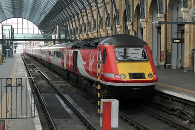 Virgin Trains East Coast HST power car class 43 no. 43317 awaiting the next departure to the North at London Kings Cross on 15th March 2018. Virgin Trains East Coast HST power car class 43 no. 43317 awaiting the next departure to the North at London Kings Cross on 15th March 2018.