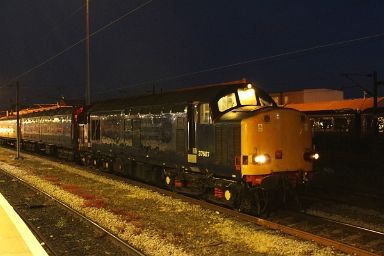 Direct Rail Service class 37/6 no. 37607 waits at Doncaster while hauling an infrastructure monitoring train towards the North at the night of 25th June 2018. Direct Rail Service class 37/6 no. 37607 waits at Doncaster while hauling an infrastructure monitoring train towards the North at the night of 25th June 2018....