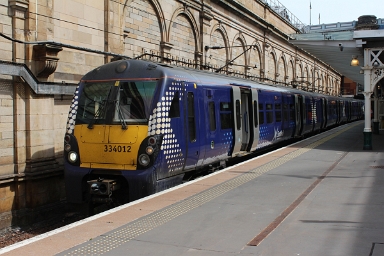 Scotrail class 334 no. 334012 awaits departure from Edinburgh Waverley on 26th June 2018. Scotrail class 334 no. 334012 awaits departure from Edinburgh Waverley on 26th June 2018.