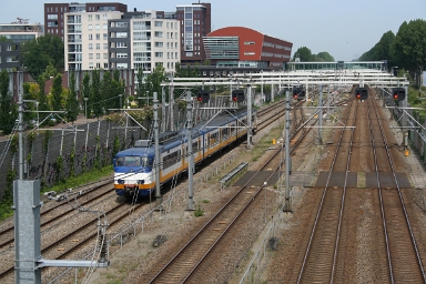 NS SGM at Maarssen An unidentified (no. 296x) Nederlandse Spoorwegen SGM InterCity train set approaches Maarssen on 7th June 2014.
